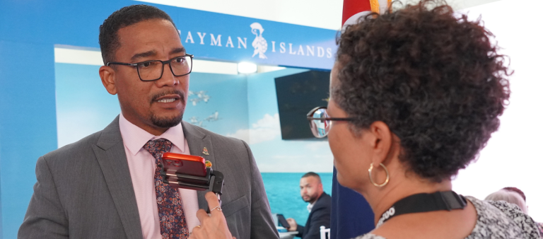 Cayman Islands tourism delegate getting interviewed at CHTA's Caribbean Travel Marketplace in Bridgetown, Barbados.